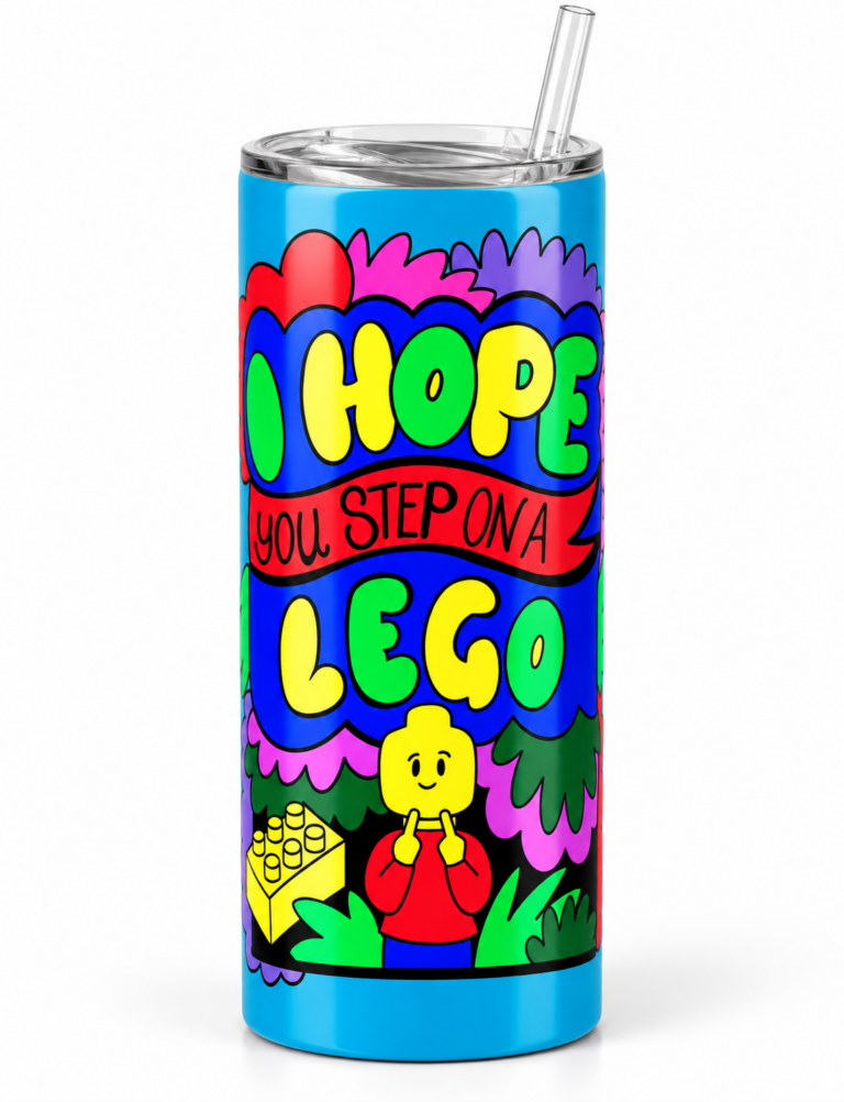 Bright blue stainless steel tumbler with colorful cartoon design featuring text 'I Hope You Step On A Lego' and a yellow Lego-style figure with a red shirt, surrounded by green and pink leafy illustrations, clear lid and straw.