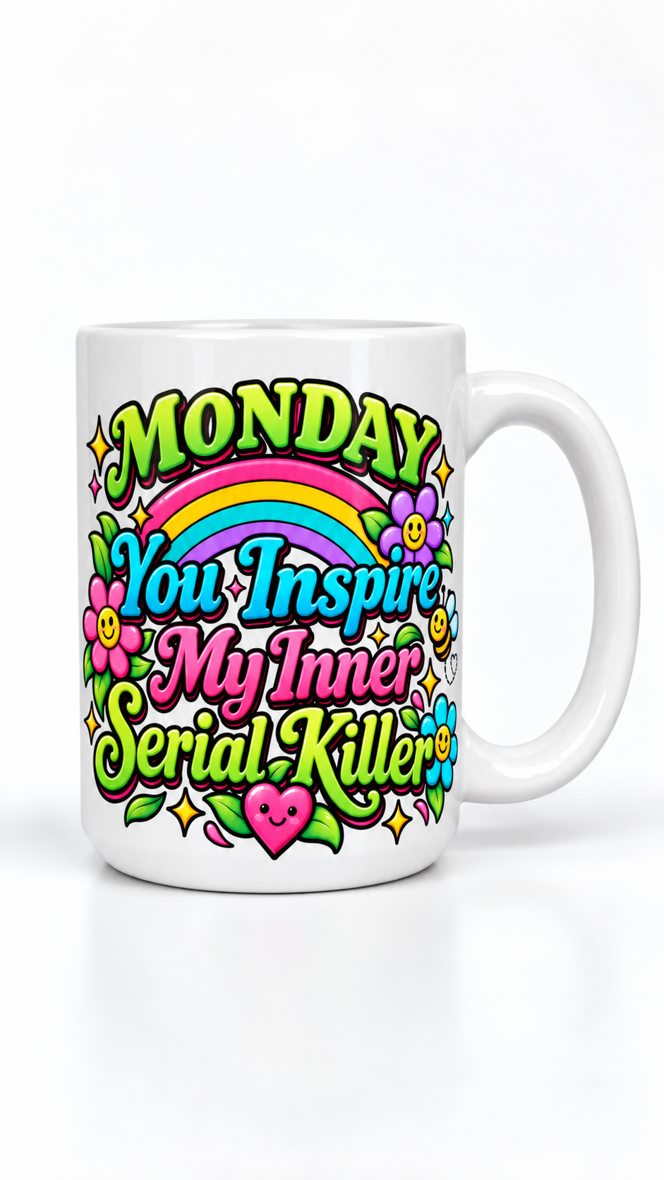 White ceramic mug with bright colorful text 'Monday You Inspire My Inner Serial Killer' surrounded by a rainbow, smiling flowers, and heart illustrations.