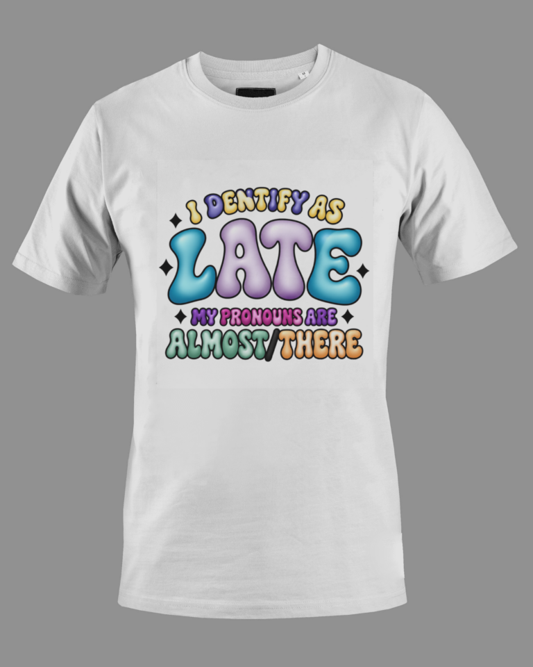 White short-sleeve t-shirt with colorful bubble letters text reading 'I Identify as Late My Pronouns Are Almost/There' in multiple colors on the front